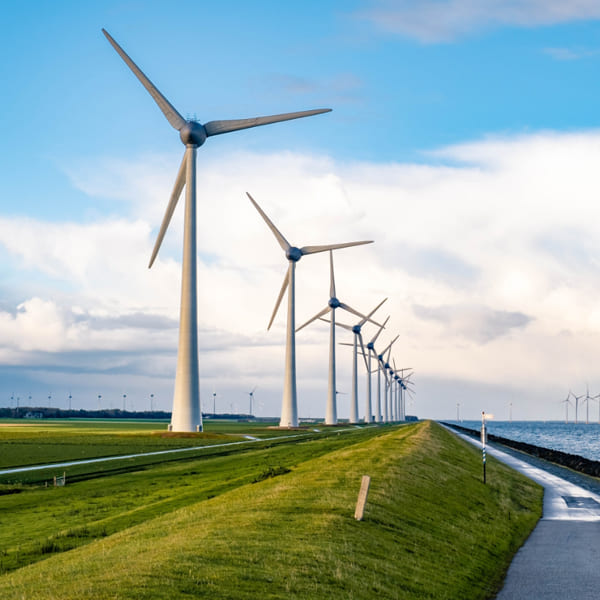 Wind energy concept with wind turbines generating renewable power for clean energy solutions